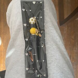 Black and Yellow Decorative Pen